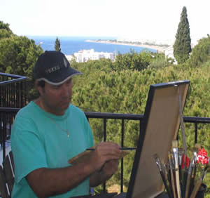 LazaR working in his house in Spain